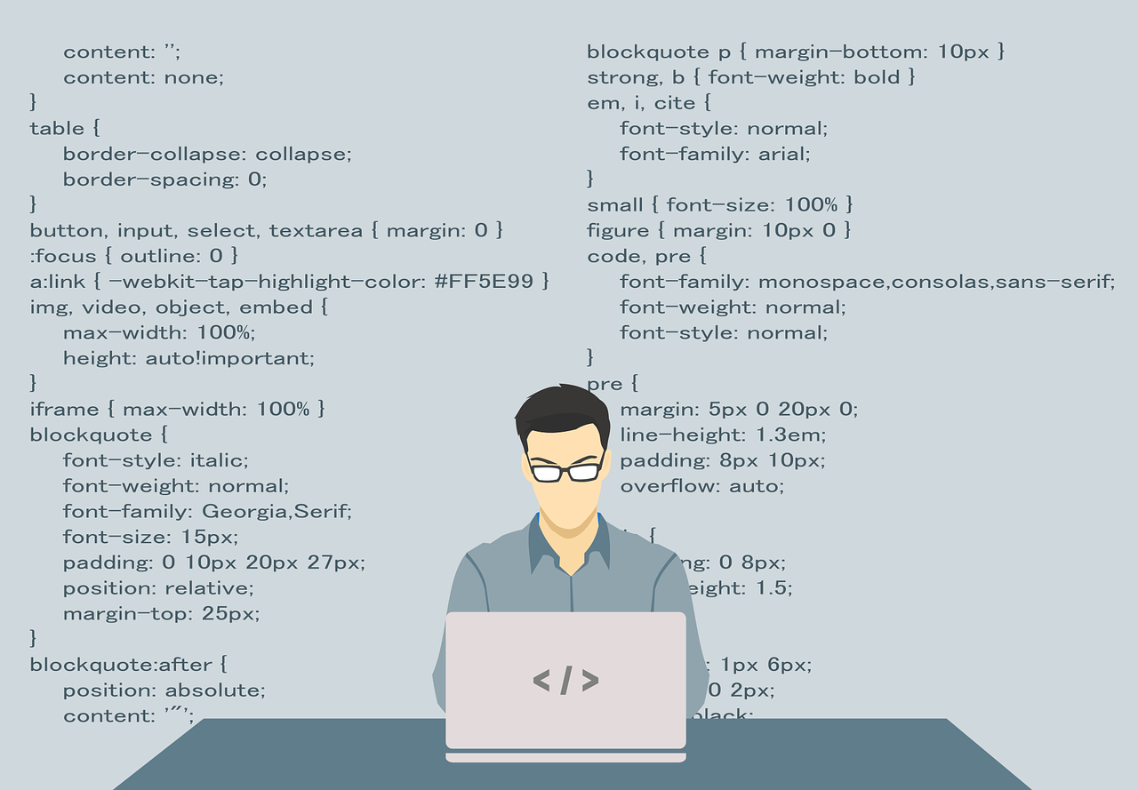 אדם יושב ליד מחשב ומפתח בעזרת קוד עיצוב של אתר
